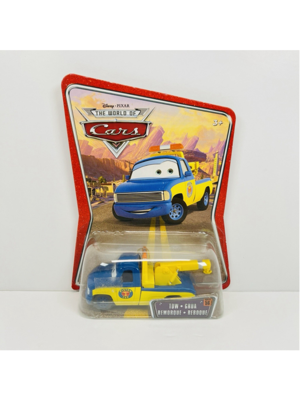 Disney Pixar World of Cars Tow #56 Piston Cup Blue Yellow Tow Truck New on Card